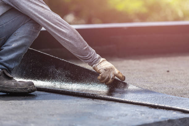 Professional Interior Drainage System technician working in Woodbury, NY